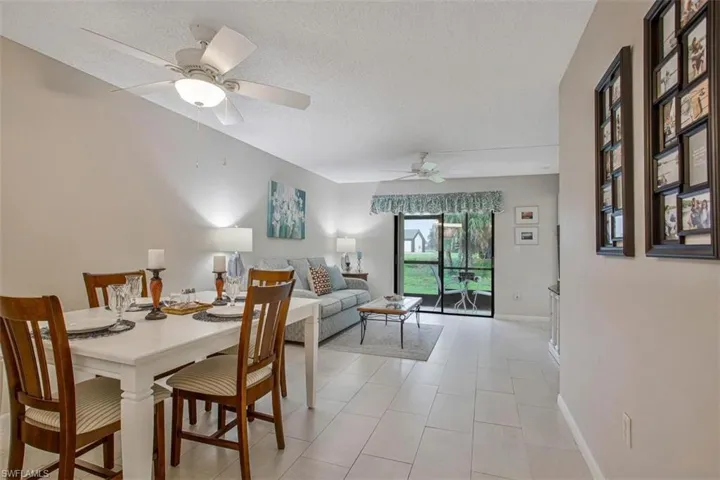 Great room showing the dining area and living area with modern flooring through out
