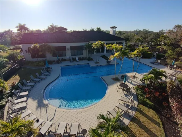 Community pool with a patio area