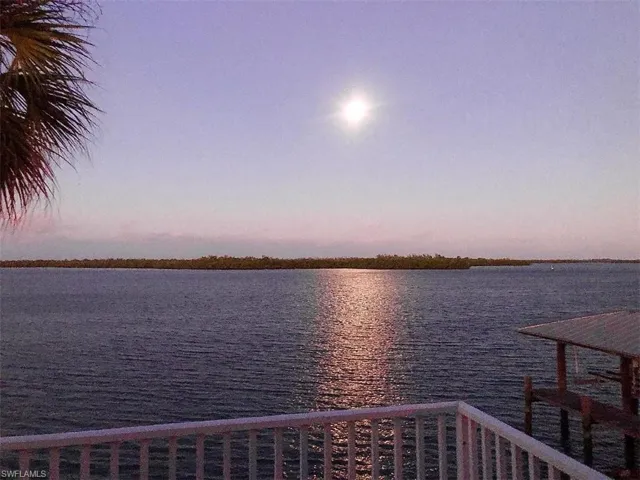 Moon Setting in Morning off the second floor balcony.