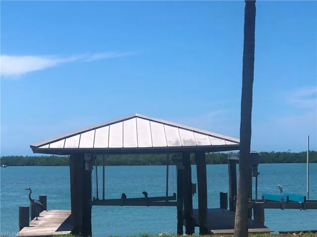 Grandfathered Boat House with Ipe-wood boardwalks.