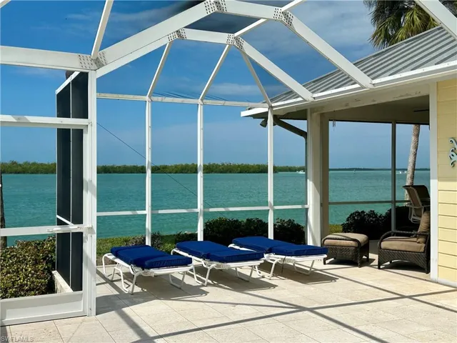 Large pool lounge areas including a covered dining room patio.    Perfect for alfesco dining.