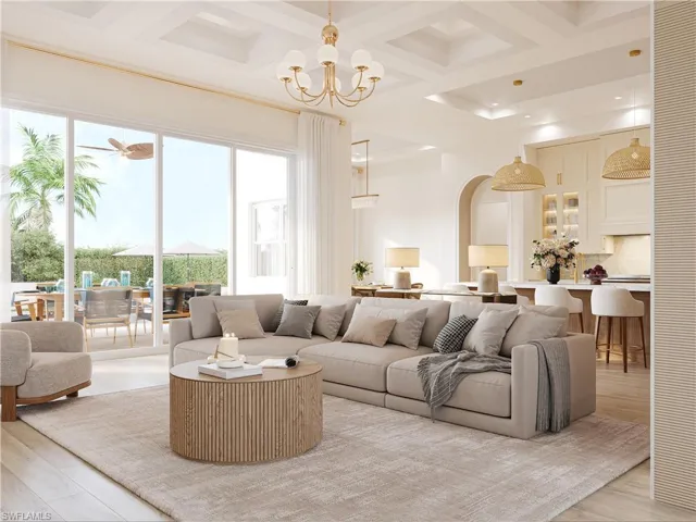 Living area with coffered ceiling, healthy amount of natural light, light wood-type flooring, and hanging lights