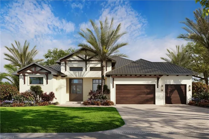 View of front of property with a garage, driveway, and a front yard