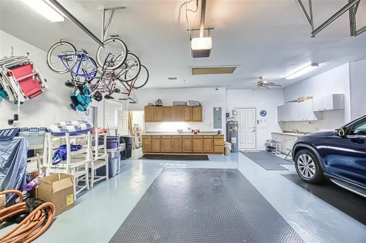 2 1/2 car garage with work bench and plenty of storage