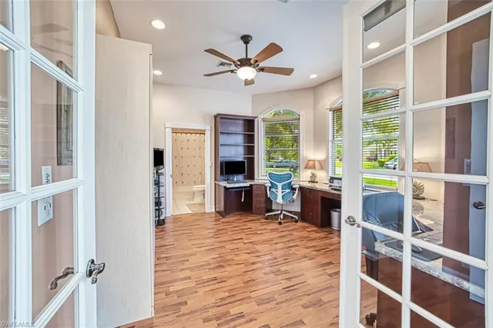 4th bedroom used as Office featuring light wood-style flooring, french doors, ceiling fan, and recessed lighting murphy bed