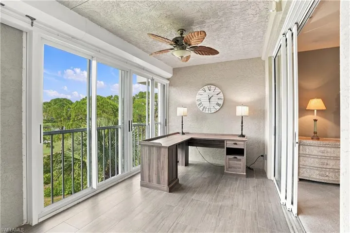 Walls of glass fill this intimate retreat with Florida sunshine.