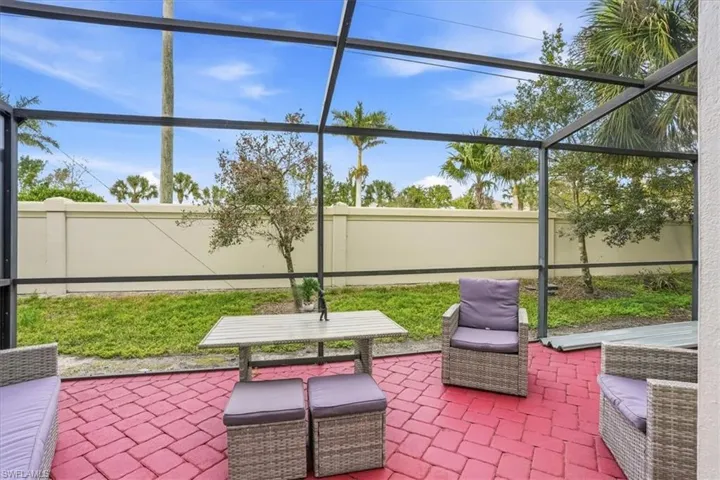 View of patio / terrace with a lanai and a sunroom