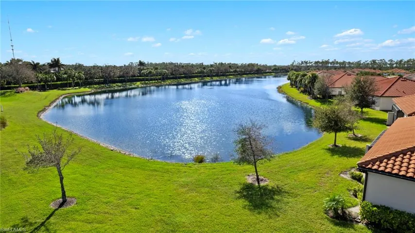 Aerial view featuring corner lot and glistening lake views.