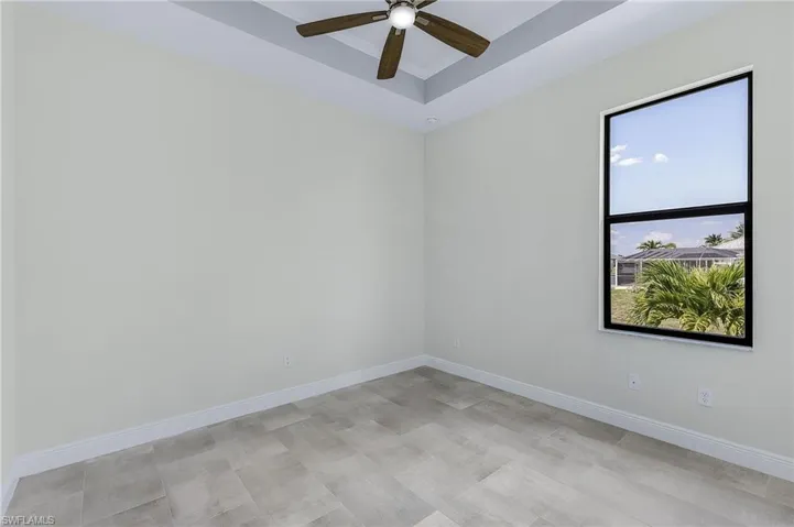 Unfurnished room with ceiling fan