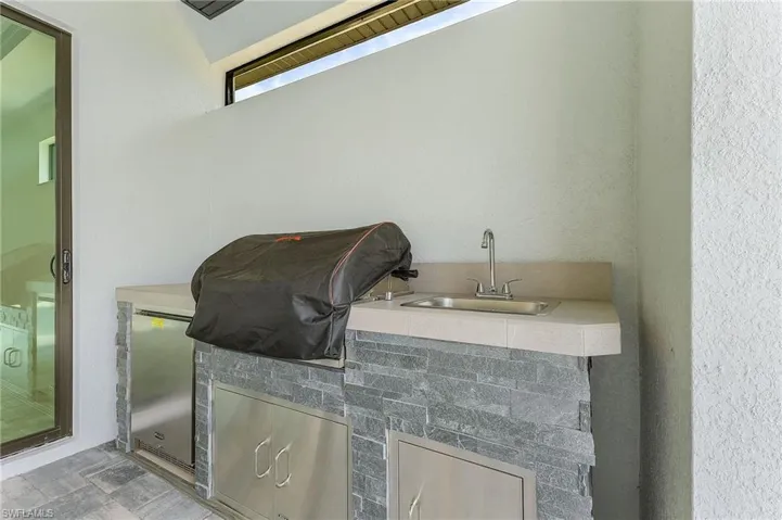 Bathroom with tile floors, sink, and independent shower and bath