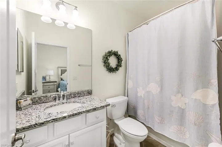 Bathroom with vanity and toilet