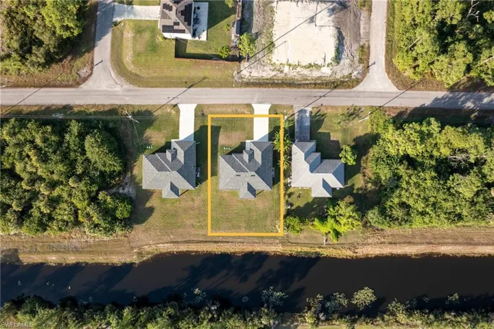 Aerial overview of property's location with property parcel outlined