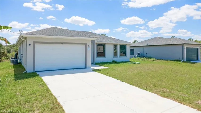 1134 Cumming St E, Lehigh Acres, Florida 33974