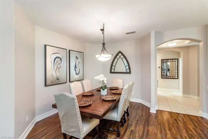 Formal dining space large enough to seat a large group comfortably.
