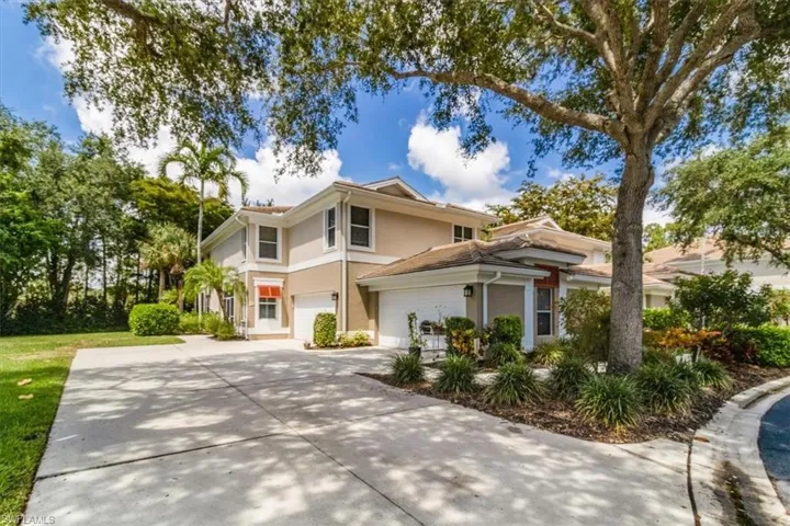 On a small culdesac in the location with a large side and rear green space with beautiful private views!