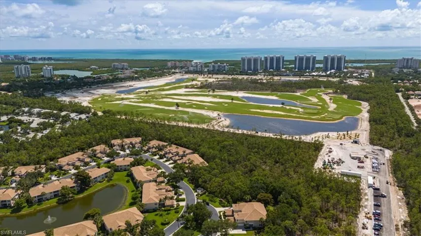 Aerial view showing close proximity to Wiggins State Park and Blue Bill Beach a bike ride or walk away on paths.
