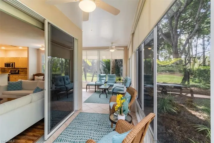 Lanai with ceiling fans to take in the beautiful preserve views.