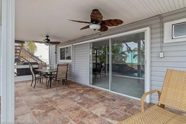 View of patio / terrace featuring ceiling fan