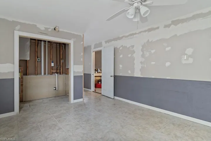 Spare room featuring ceiling fan