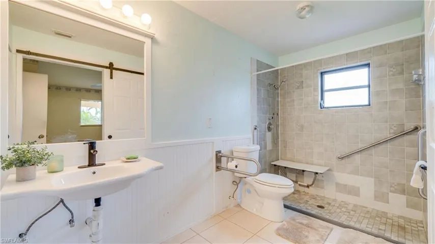 The Primary Bathroom is Handicap Accessible Yet Easy To Convert If Not Needed