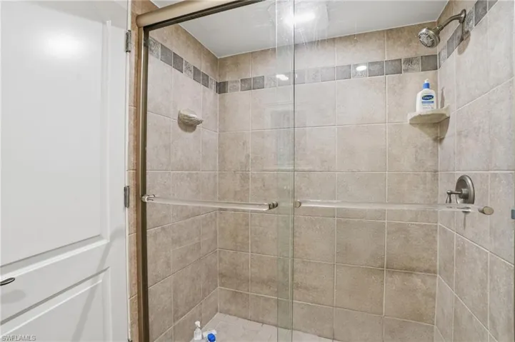 Guest bath featuring a stall shower