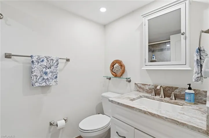Guest Bathroom completely updated with walk-in shower and updated vanity and counters. -Virtually Edited