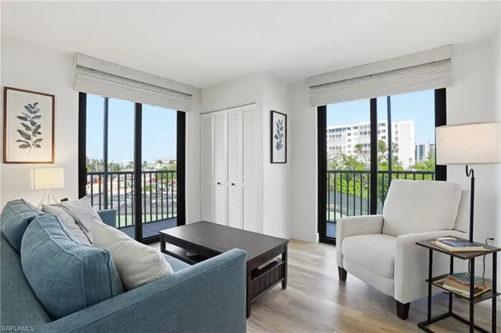 This is Bedroom #3 or a Flex Room.  Enhanced with two small balconies for additional light and space.-Virtually Edited Image