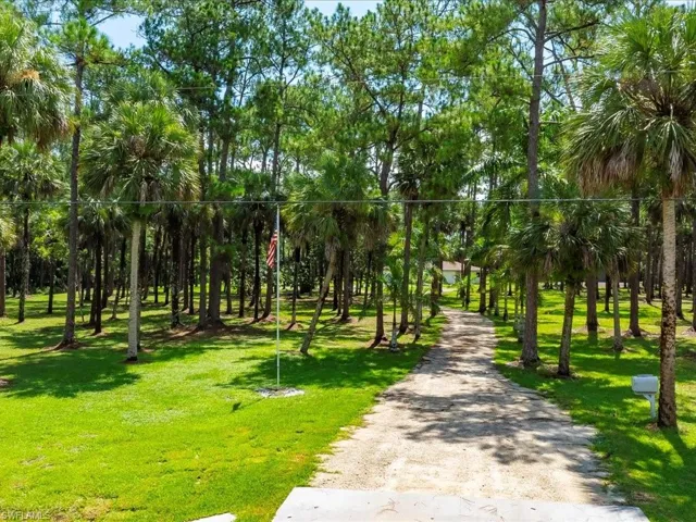 View of community featuring a lawn
