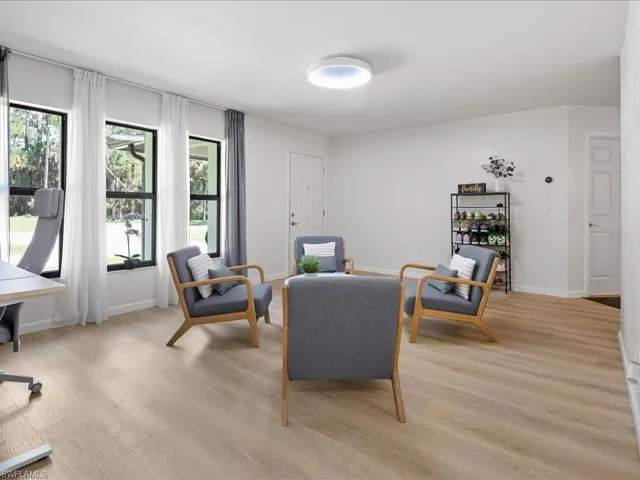 Sitting room featuring light wood finished floors