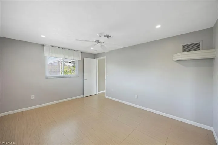 Unfurnished room with recessed lighting and ceiling fan
