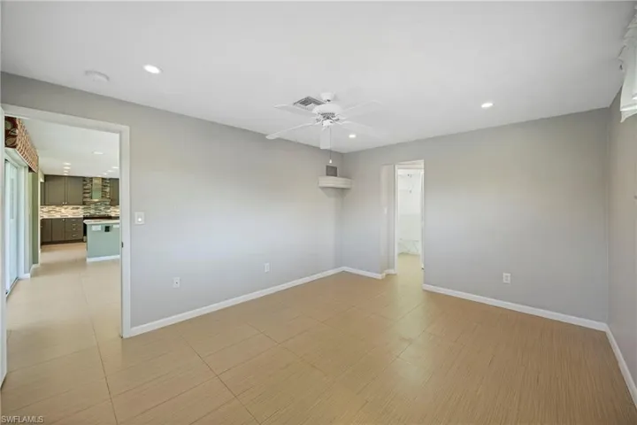 Spare room featuring recessed lighting and a ceiling fan