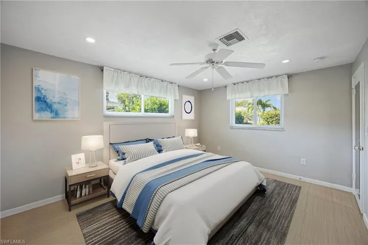 Master Bedroom featuring recessed lighting and a ceiling fan