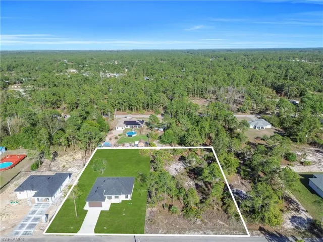 View of property location featuring a forest and property boundaries highlighted