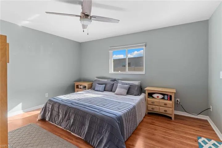 Master Bedroom featuring light wood-style floors and ceiling fan