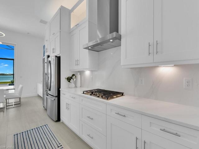 Gas Range, Quartz Counters & Backsplash