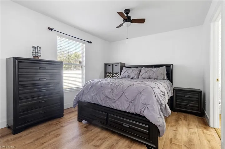 Bedroom featuring light wood finished floors and ceiling fan