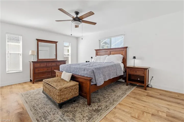 Bedroom featuring a ceiling fan and light wood finished floors