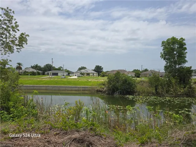 Water view featuring nearby suburban area