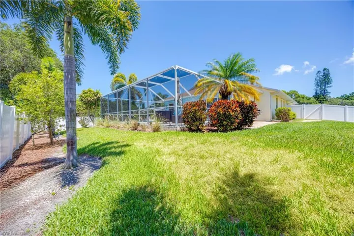 View of fenced in backyard