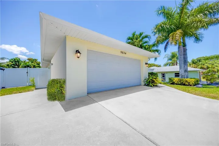 View of garage & Extended driveway parking space