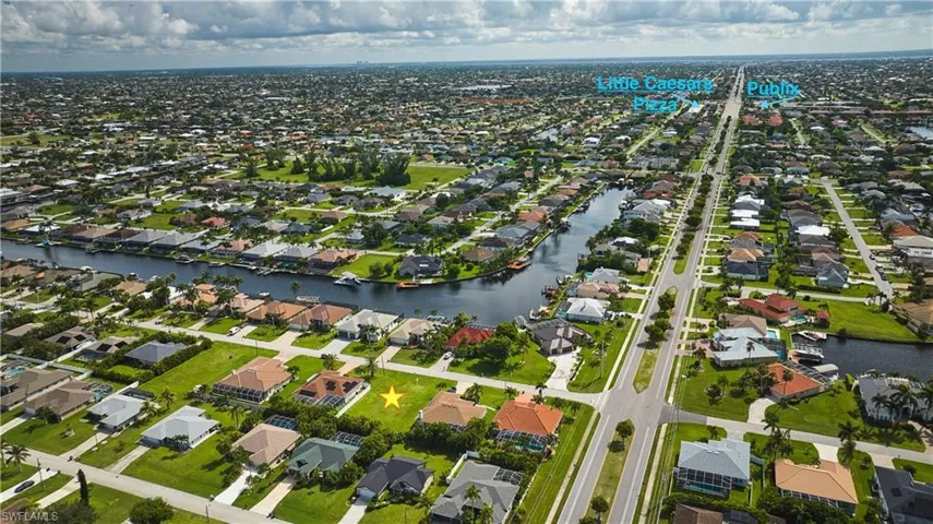 Aerial view of residential area with a nearby body of water