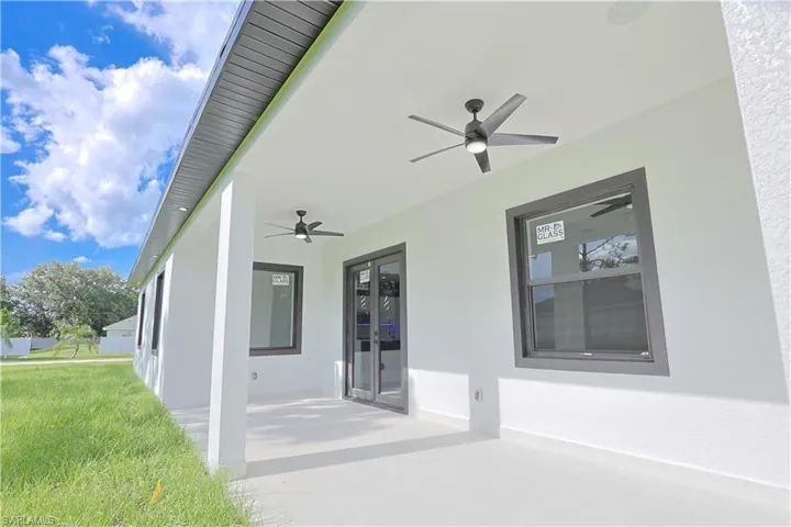 View of patio featuring a ceiling fan