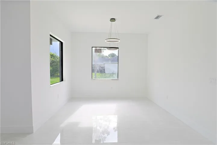 Empty room with baseboards