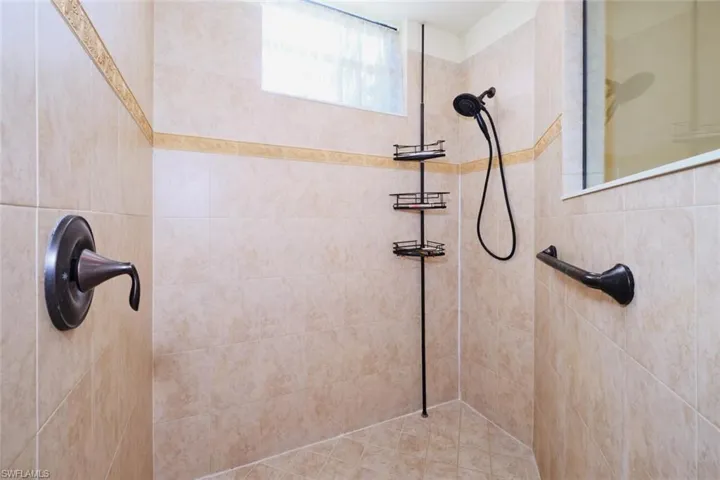 Bathroom with tiled shower