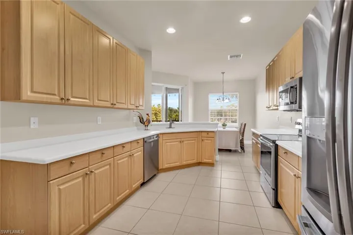 Kitchen with decorative light fixtures