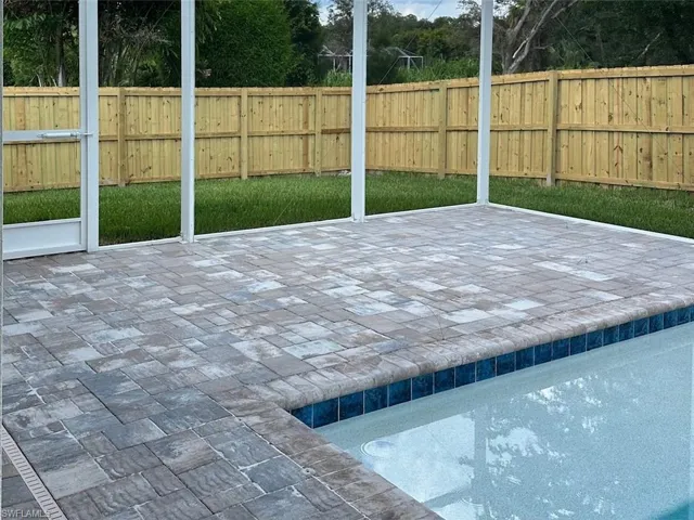 View of swimming pool with a patio