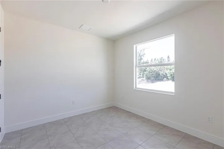 Spare room with baseboards