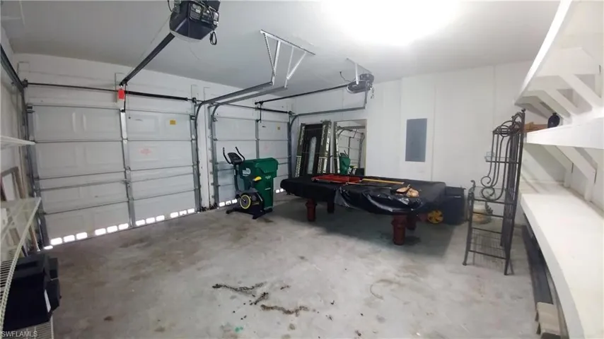 2 CG w/Auto Openers, elec panel, hurricane shutters