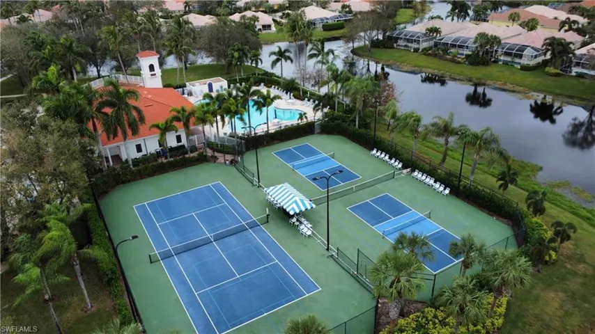 Aerial view of a nearby body of water and a pool