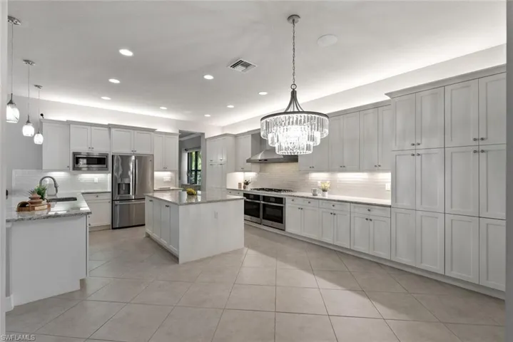 Large kitchen with island and breakfast bar